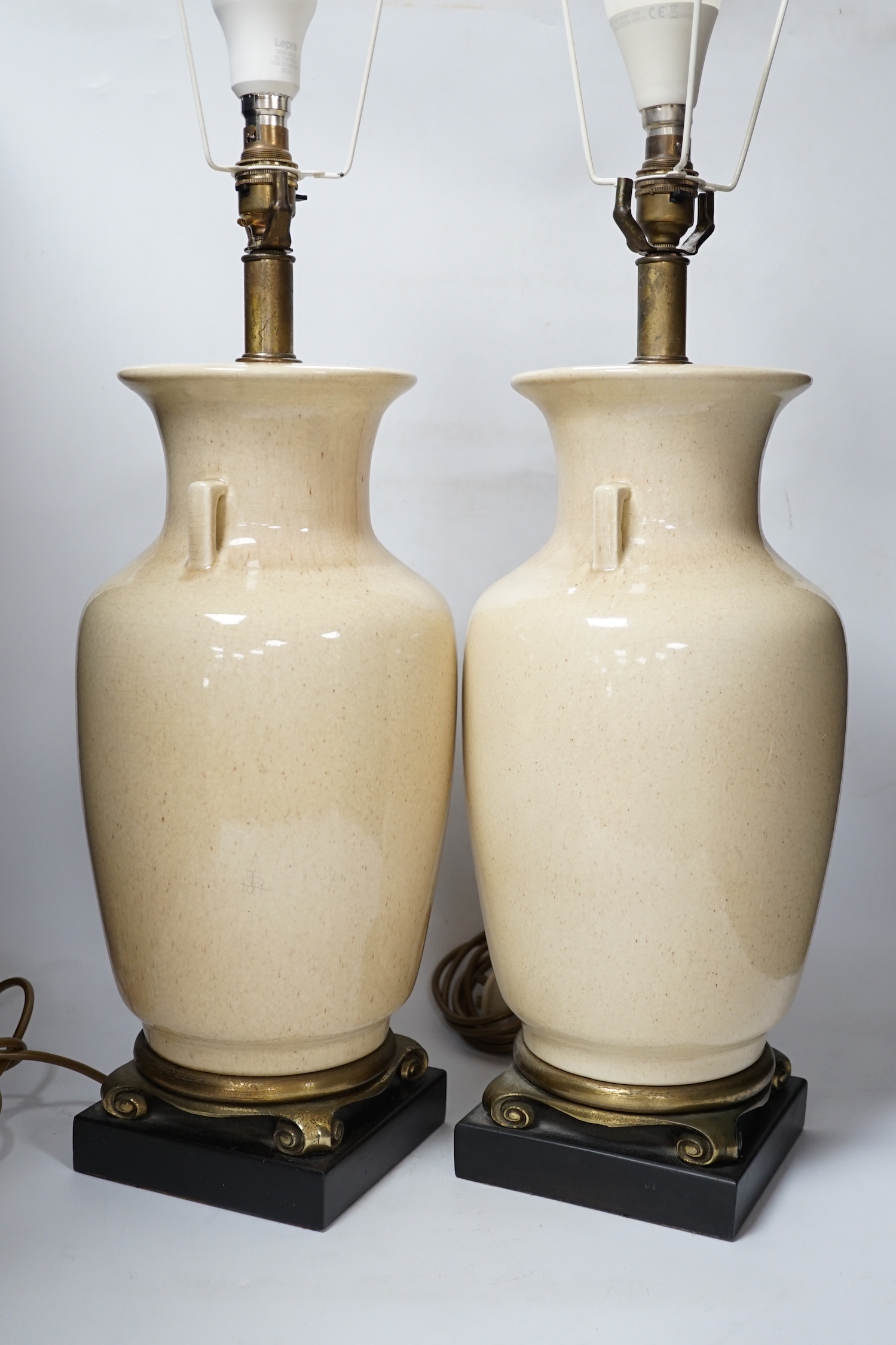 A pair of Chinese glazed table lamps, 43cm to ceramic top